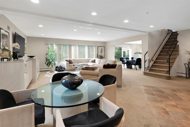 living area featuring a baseboard heating unit, stairway, light carpet, and recessed lighting