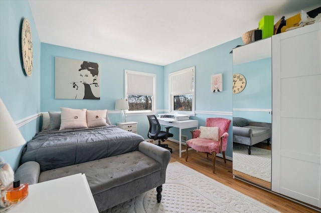 bedroom featuring wood finished floors