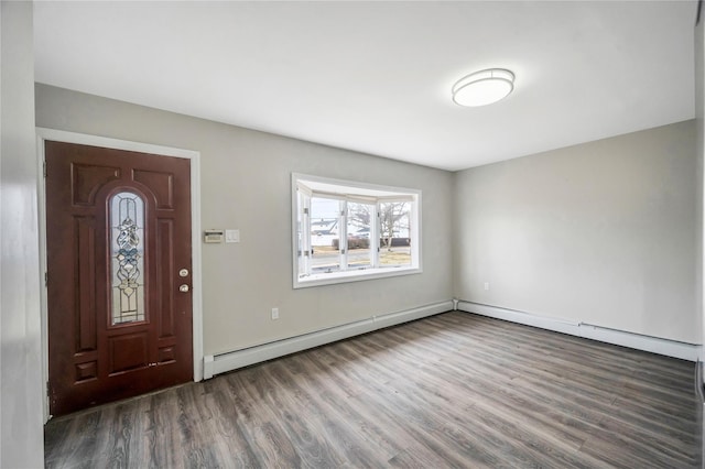 entrance foyer with a baseboard radiator and wood finished floors