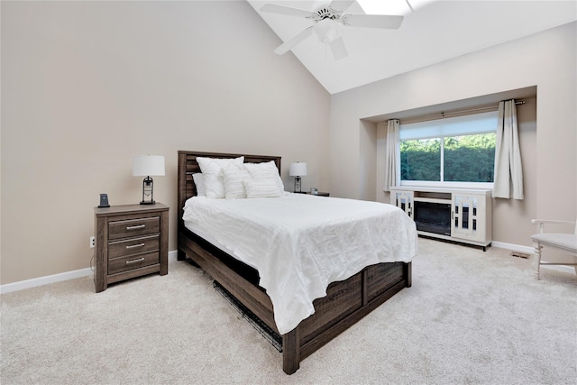 carpeted bedroom with high vaulted ceiling, visible vents, ceiling fan, and baseboards