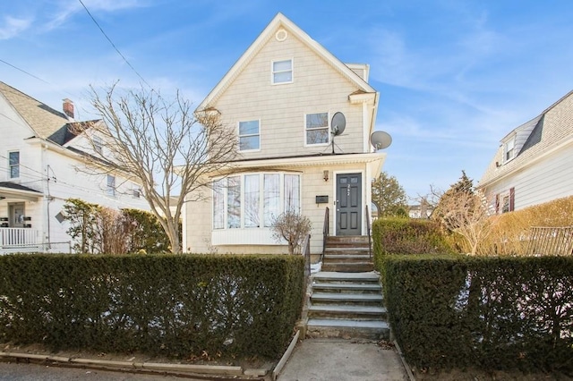 view of front of house with fence