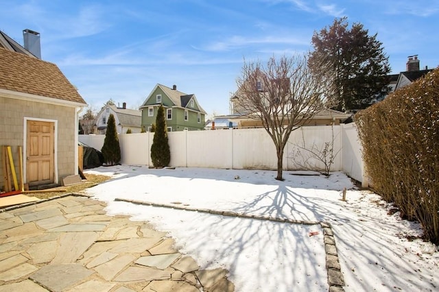 exterior space with a fenced backyard