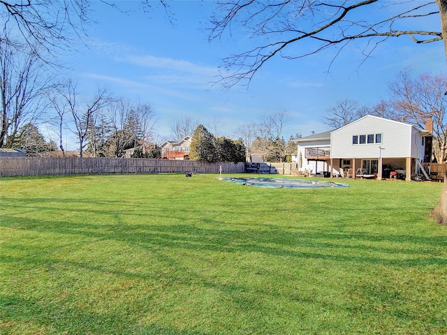 view of yard with a patio and a fenced backyard