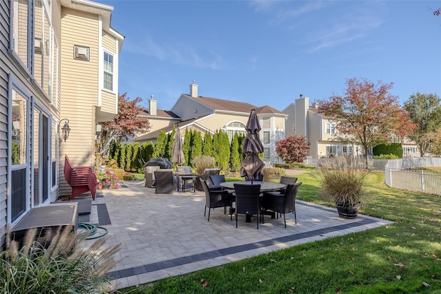 view of patio / terrace featuring fence