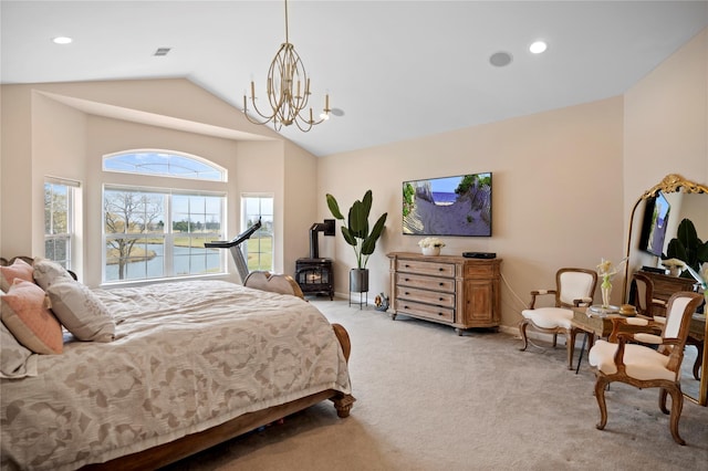 bedroom featuring light carpet, baseboards, a wood stove, a notable chandelier, and recessed lighting