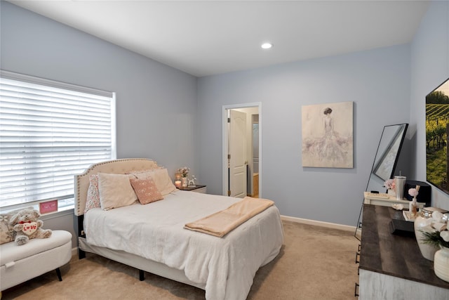 bedroom with recessed lighting, baseboards, and light colored carpet