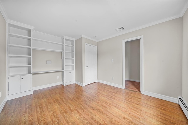 empty room with visible vents, light wood-style flooring, ornamental molding, baseboards, and baseboard heating