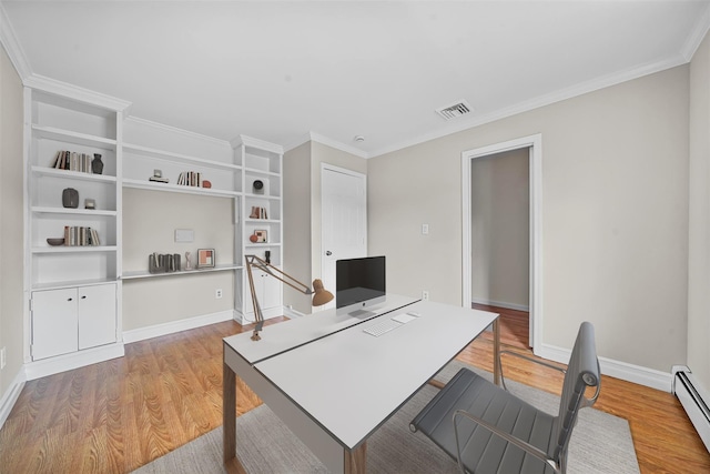 office area featuring a baseboard heating unit, light wood-style floors, visible vents, and ornamental molding