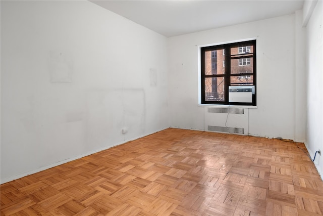 empty room featuring radiator heating unit