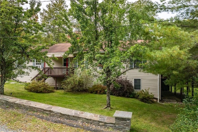 exterior space with covered porch and a yard