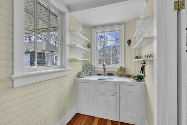 140 Newtown Rd, Hampton Bays, NY 11946 - bar with dark wood-style flooring