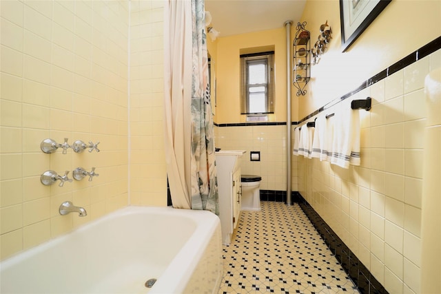 full bathroom with toilet, shower / bath combination with curtain, tile patterned flooring, and tile walls