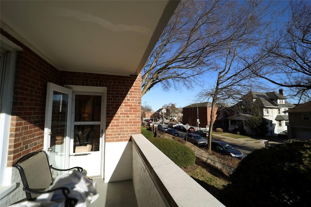 balcony featuring a residential view