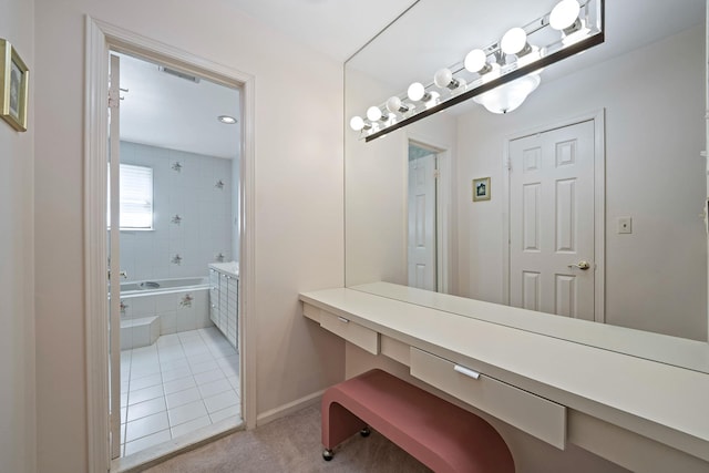 full bath featuring visible vents, tiled shower / bath, baseboards, and tile patterned floors