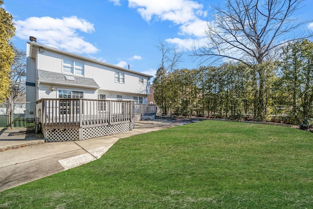 view of yard with a deck