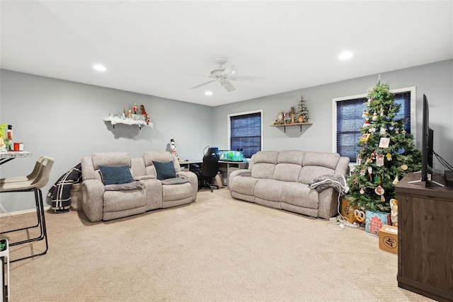 living room with carpet, a ceiling fan, and recessed lighting