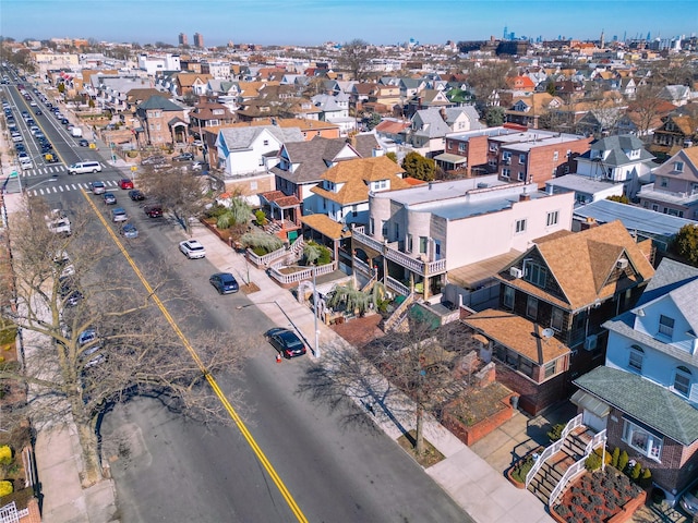 birds eye view of property with a residential view