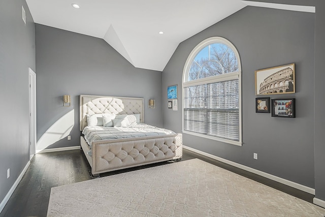 bedroom featuring recessed lighting, high vaulted ceiling, baseboards, and wood finished floors