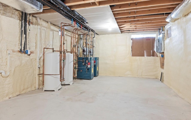 unfinished below grade area with a heating unit and gas water heater