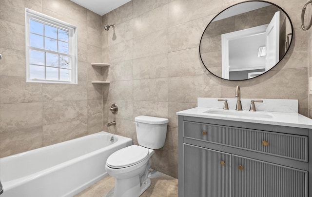 full bathroom featuring shower / washtub combination, vanity, toilet, and tile walls