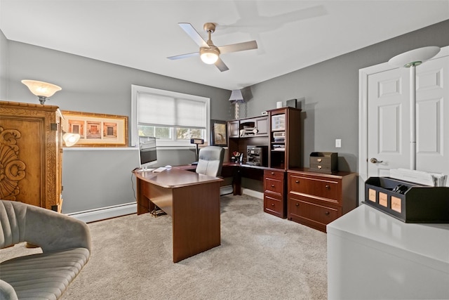 carpeted office space featuring ceiling fan, baseboards, and a baseboard radiator