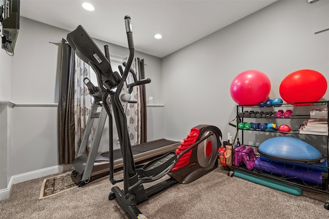 exercise room with recessed lighting, baseboards, and carpet flooring