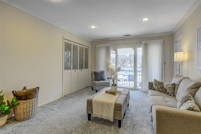 carpeted living room with baseboards, ornamental molding, and recessed lighting