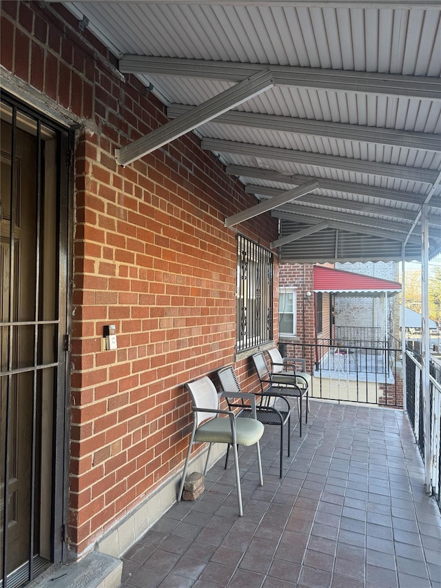 view of patio / terrace with a balcony