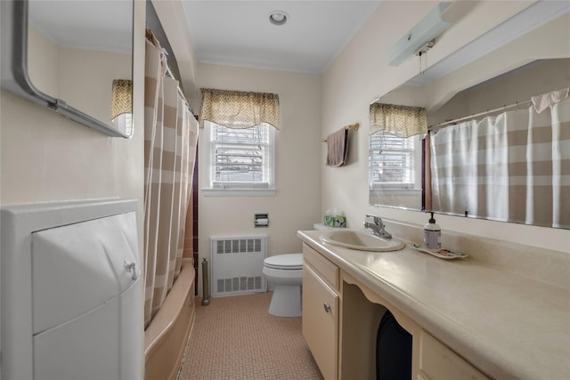 bathroom with tile patterned floors, shower / tub combo with curtain, toilet, radiator, and vanity