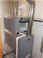 utility room with heating unit