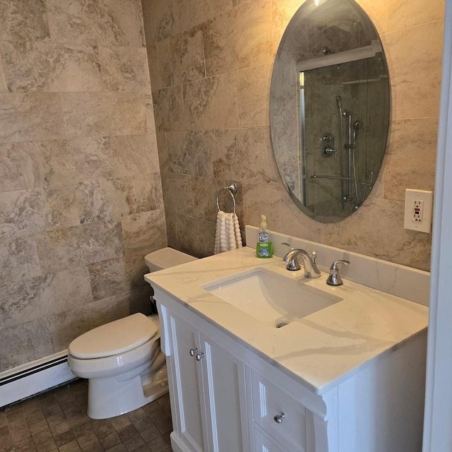 bathroom featuring toilet, a baseboard radiator, tile walls, and vanity