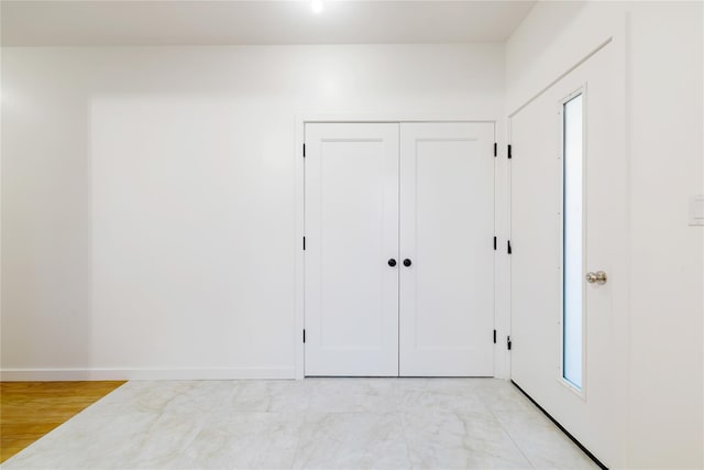 entrance foyer featuring baseboards