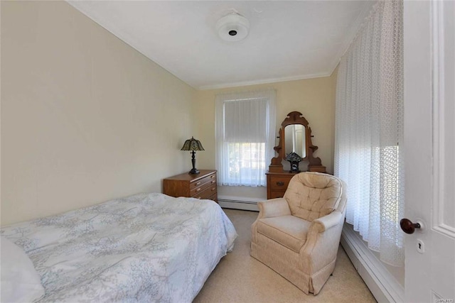 bedroom featuring carpet flooring, crown molding, and baseboard heating