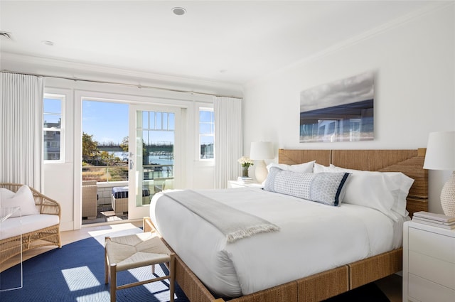 bedroom featuring ornamental molding, access to outside, and visible vents