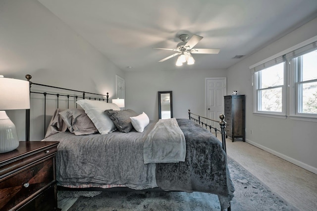 bedroom with a ceiling fan, carpet, baseboards, and visible vents