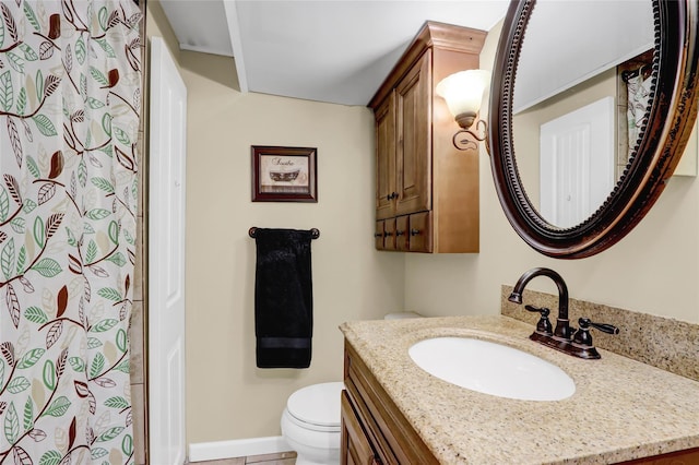 bathroom featuring a shower with curtain, toilet, and vanity