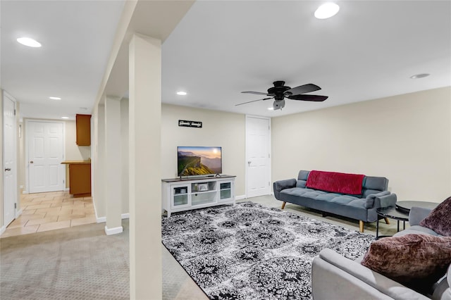 living room featuring light carpet, recessed lighting, baseboards, and ceiling fan