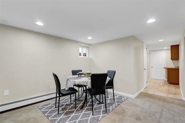 dining space featuring recessed lighting, baseboards, light carpet, and baseboard heating