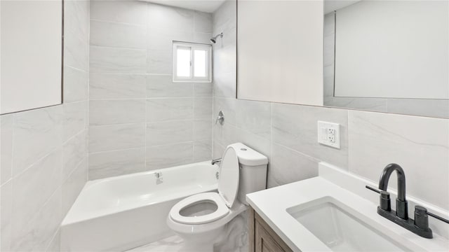 bathroom featuring vanity, shower / tub combination, toilet, and tile walls