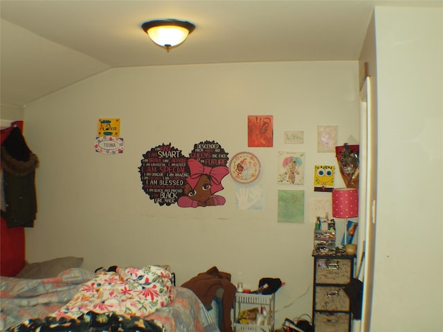 bedroom featuring vaulted ceiling