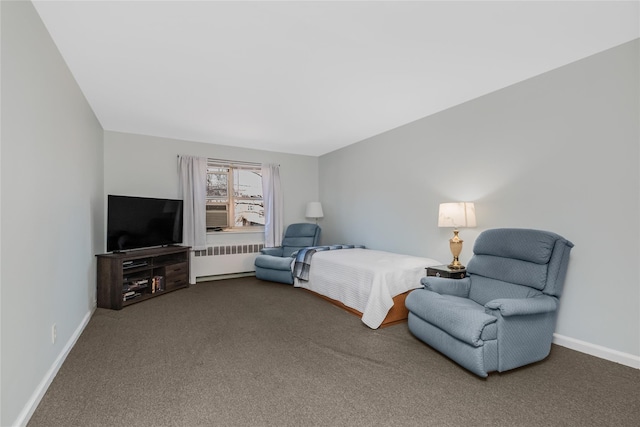 bedroom with carpet, radiator, and baseboards