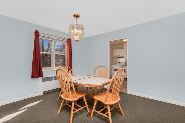 carpeted dining area with a chandelier, radiator heating unit, and baseboards