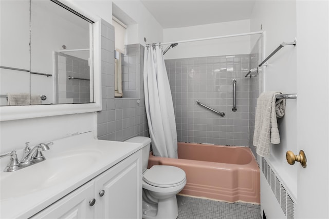 bathroom featuring tile patterned flooring, toilet, vanity, radiator, and shower / bath combo