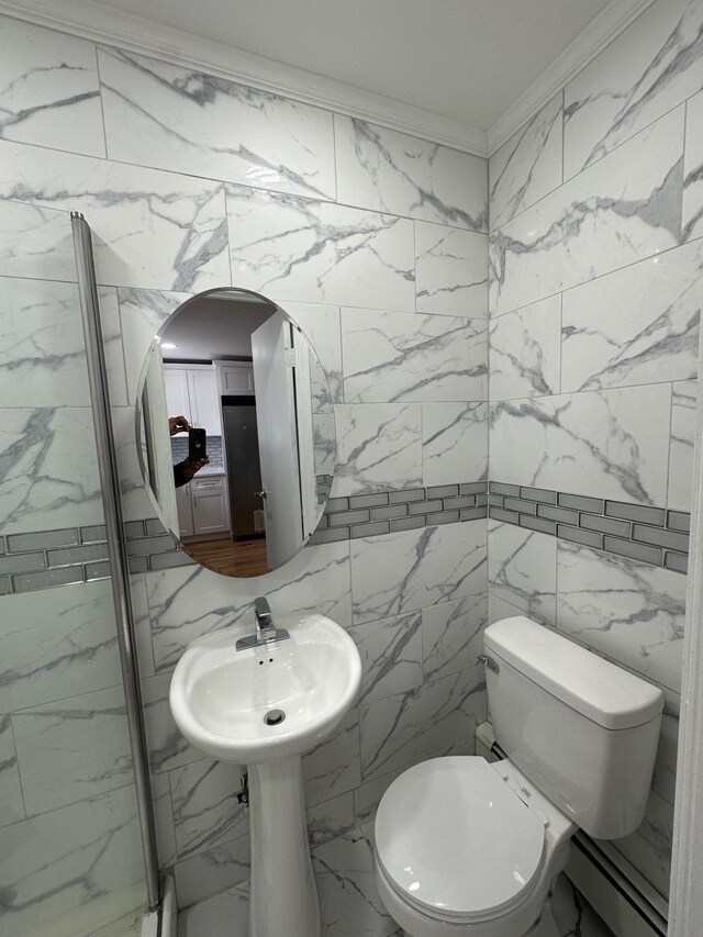 bathroom featuring toilet and stone wall