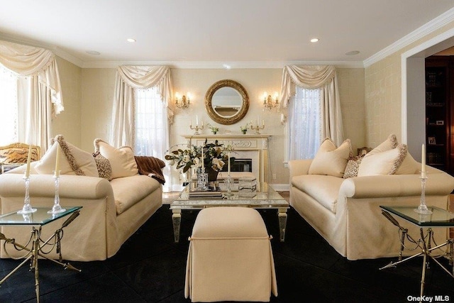 living room featuring ornamental molding, a fireplace, and recessed lighting