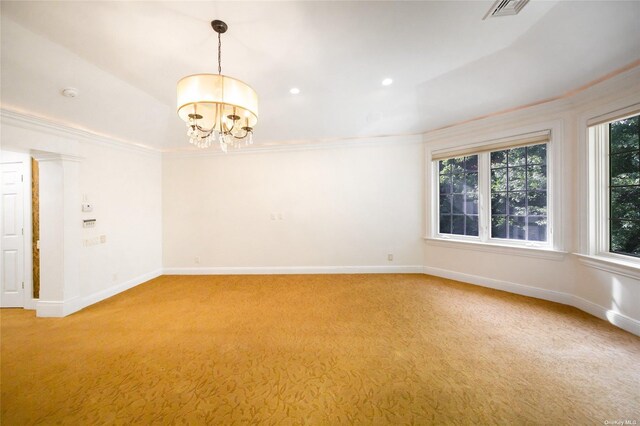 unfurnished room with baseboards, visible vents, crown molding, and light colored carpet