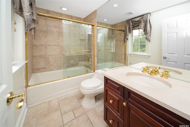 full bathroom featuring visible vents, toilet, shower / bath combination with glass door, vanity, and recessed lighting