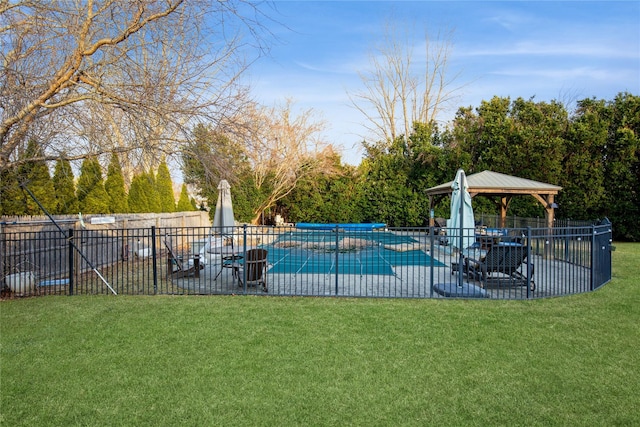 view of pool featuring a fenced in pool, a patio, a lawn, fence, and a gazebo