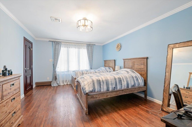 bedroom featuring dark wood-style floors, ornamental molding, visible vents, and baseboards