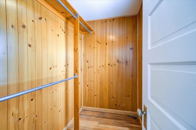 spacious closet with wood finished floors